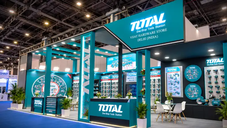 TOTAL One-Stop Tools Station exhibition stall design with teal branding and illuminated structures